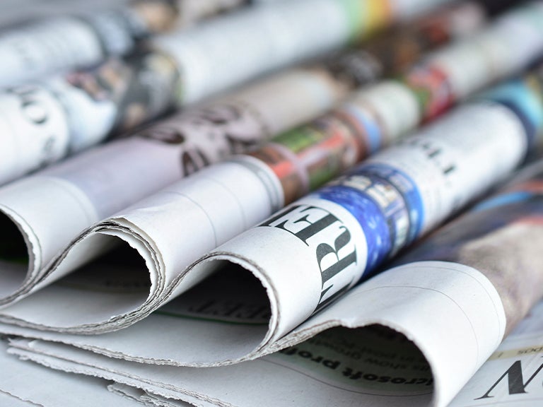 Stapel kranten - Nestlé Professional