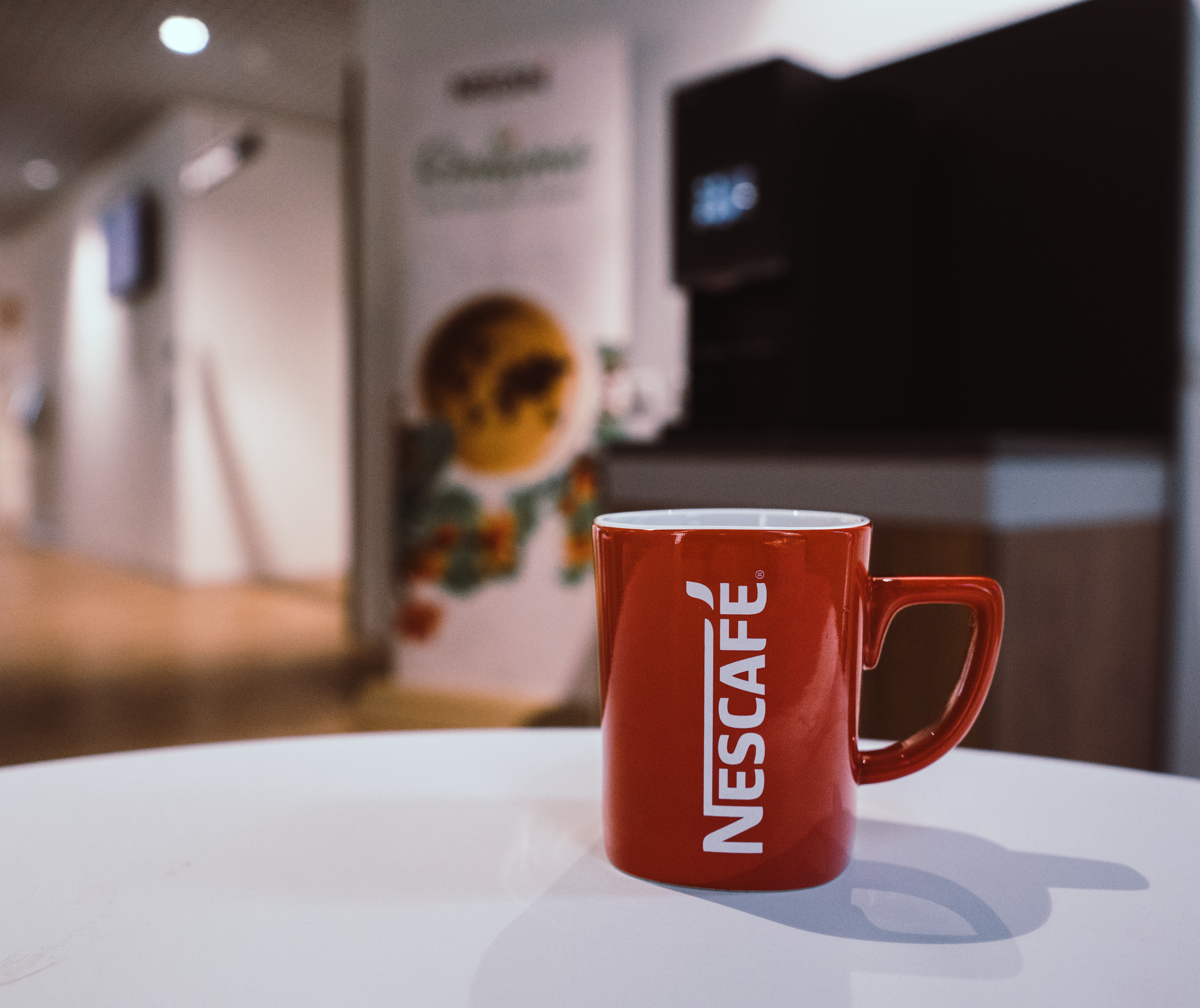 Nescafe mok en machine