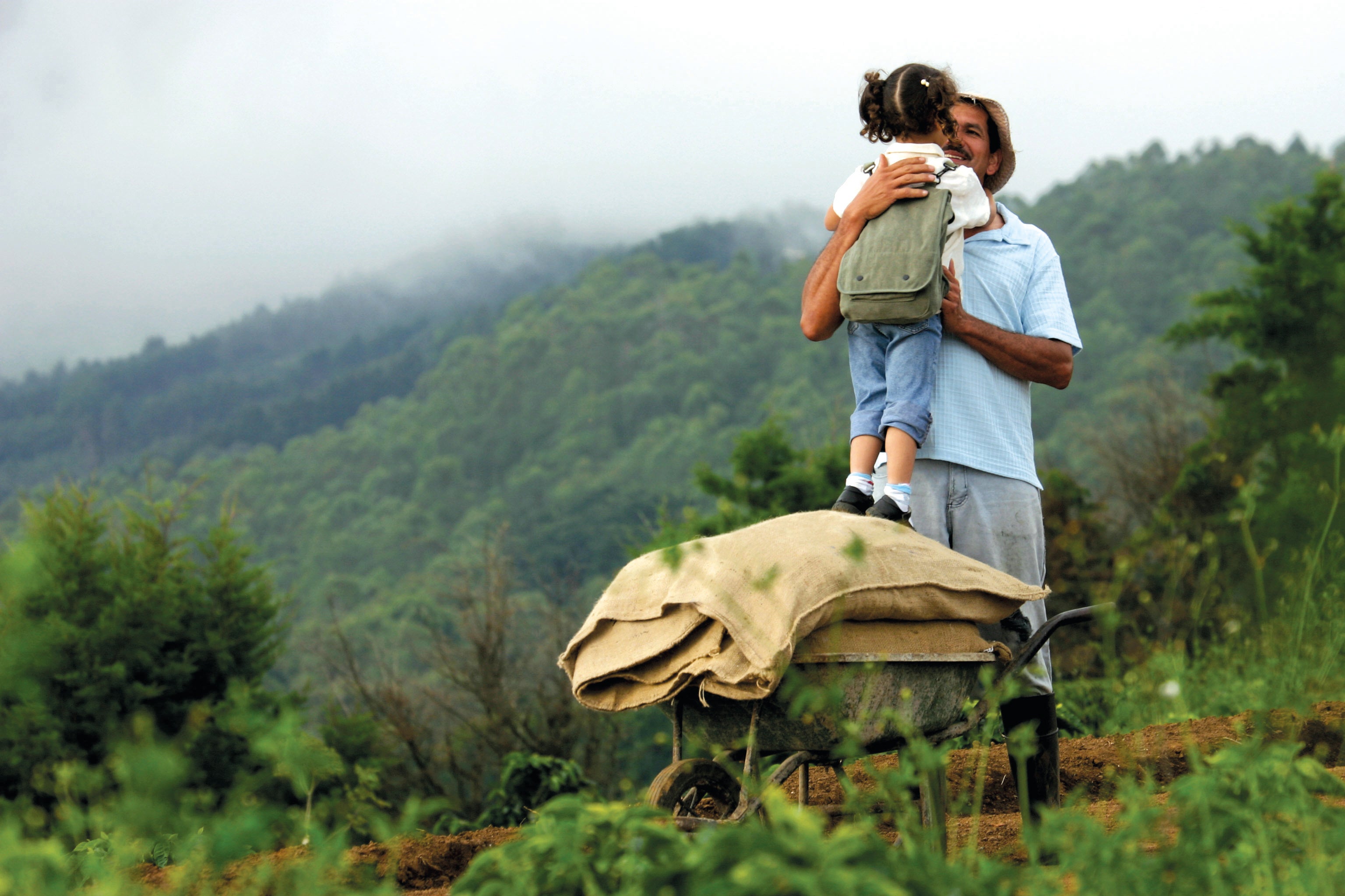Costa Ricaanse koffieteler met dochter