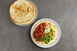 Een bord taco's met guacamole