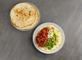 Een bord taco's met guacamole 